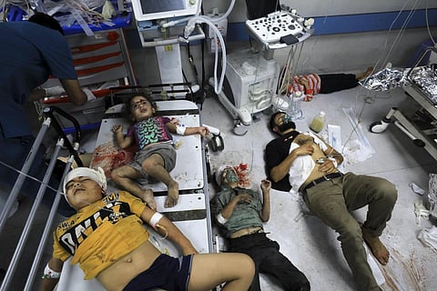 Palestinians wounded in the Israeli bombardment wait for treatment in Shifa Hospital in Gaza City, Monday, Oct 23, 2023. (Photo | AP)