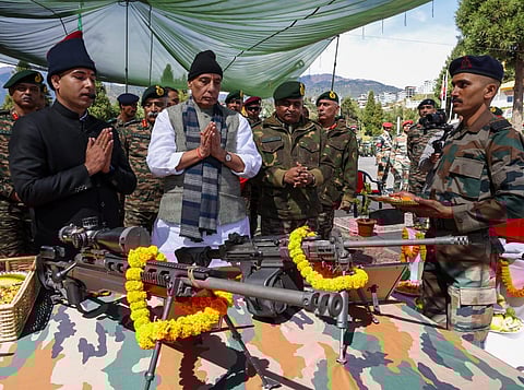 Defence Minister Rajnath Singh carrying out  Shastra Puja with the troops at Tawang, Arunachal Pradesh. (Photo | Rajnath Singh Twitter)