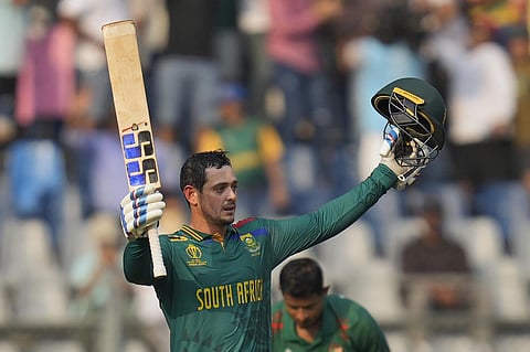 South Africa's Quinton de Kock celebrates his century during the World Cup match against Bangladesh in Mumbai (Photo | AP)