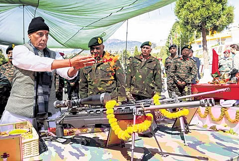 Defence Minister Rajnath Singh performs ‘Shastra Puja’ on ‘Vijayadashami’ during his visit to a forward post in Arunachal Pradesh in Tawang district on Tuesday | pti