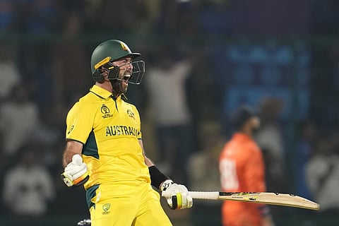 Australia's Glenn Maxwell celebrates his century during the World Cup match against Netherlands in New Delhi (Photo | AP)