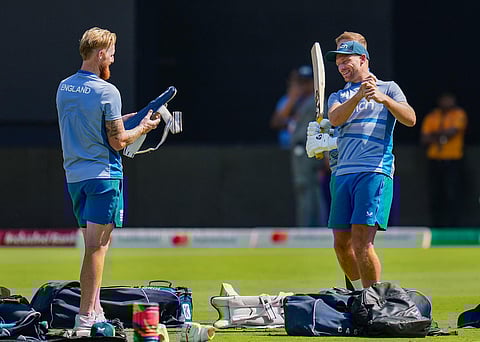 England's captain Jos Buttler with teammate Ben Stokes during a practice session ahead of the ICC Men's Cricket World Cup match between Sri Lanka and England. (Photo | PTI)