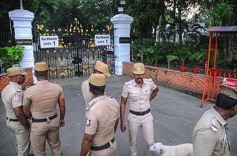 Police personnel guard outside the Raj Bhavan after a petrol bomb was hurled outside its main gate, in Chennai, Wednesday, Oct. 25, 2023. (Photo | PTI)