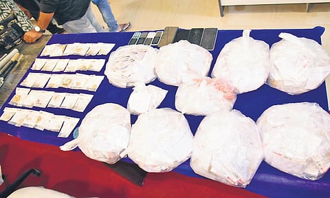 Krishna district police displayed the recovered gold, which was stolen from   Manappuram Financing Limited, in Machilipatnam on Friday I Express