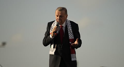 Turkish President Recep Tayyip Erdogan, speaks to the attendees during a rally to show their solidarity with the Palestinians, in Istanbul.(Photo | AFP)