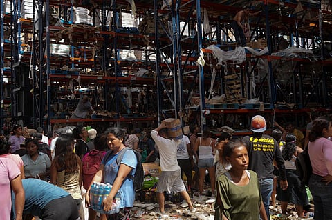 People take items from stores in the aftermath of Hurricane Otis, in Acapulco, Mexico, Saturday, Oct. 28, 2023. (Photo | AP)