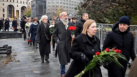 Foreign envoys including US Ambassador Lynne Tracy lays flowers in memory of the victims of the vicitms of Stalin's terror outside FSB (former KGB) headquarters in Moscow. (Photo | AFP)