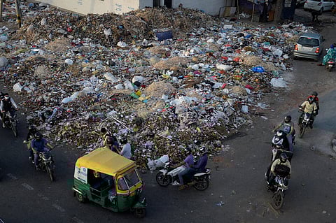 New Delhi Garbage dumped on a road in East Delhi on Friday as MCD workers are on strike for the last 10 days due to non-payment of salaries for three months by the Municipal Corporations in Delhi. | P