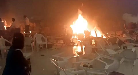 Fire broke out inside the hall after the triple bomb blasts that rocked the Jehovah's Witnesses prayer meeting at Zamra International Convention Centre on Sunday .Express