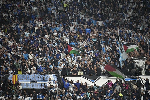 Marseille fans wait for the start of the French League One soccer match between Olympique de Marseille and Lyon at the Velodrome Stadium, in Marseille, France, Sunday, Oct. 29, 2023. (Photo | AP)