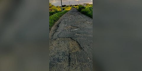 A damaged stretch of the road connecting Pulivalam and Mukkombu on the Tiruchy-Karur NH | Express