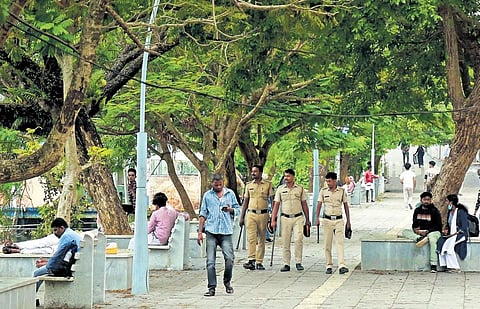 Police officials patrolling at Marine Drive walkway on Monday. (Photo | T P Sooraj)
