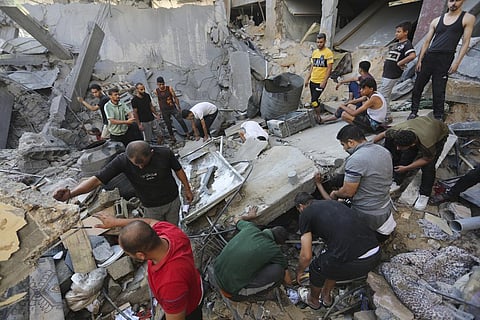 Palestinians look for survivors after an Israeli strike in Rafah, Gaza Strip, Tuesday, Oct. 31, 2023. (Photo | AP)