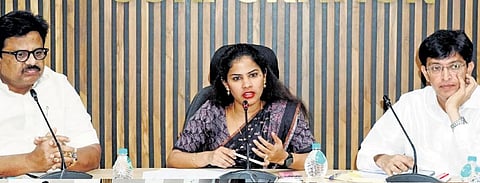 Mayor R Priya chairing a meeting to review the progress of the Makkalai Thedi Mayor scheme, on Monday | Express