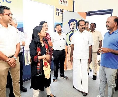 Health Minister Ma Subramanian interacting with officials after inaugurating coastal litter monitoring kiosk at Besant Nagar beach on Monday | Express