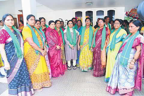 Nara Bhuvaneswari, wife of TDP chief Chandrababu Naidu, interacts with women farmers of Amaravati, in Rajamahendravaram on Tuesday I Express