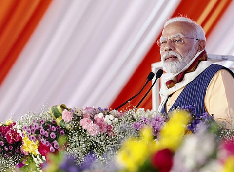 Prime Minister Narendra Modi addresses during an event organised for laying of foundation stone of various developmental projects, in Nizamabad. (Photo | PTI)