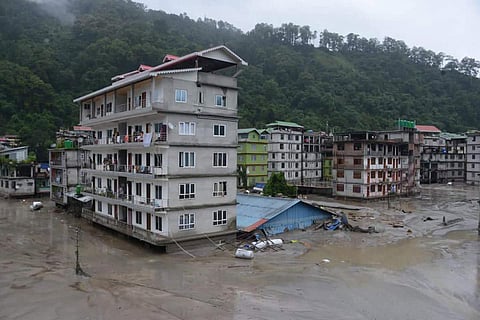 A sudden cloudburst over Lhonak Lake in North Sikkim resulted in a flash flood in the Teesta River, which was compounded by the release of water from a dam. (AP)