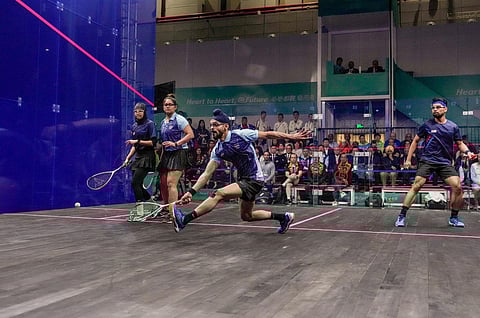India's Dipika Pallikal and Harinder Pal Singh Sandhu in action during the final match of Mixed Doubles squash event. (Photo | PTI)