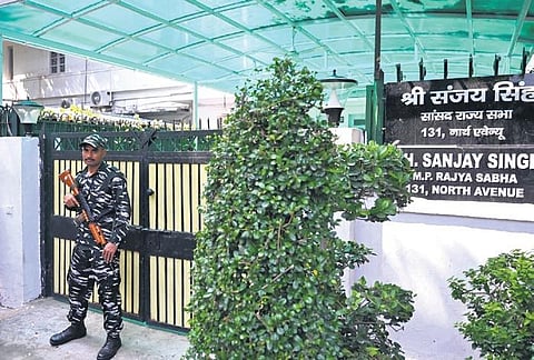 A paramilitary jawan posted outside AAP MP Sanjay Singh’s residence on Wednesday; Express