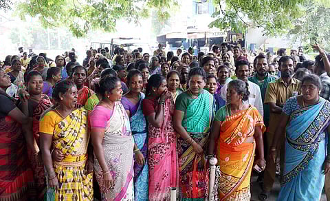 ellore corporation Sanitary workers of Zone 2 and 3 in the Vellore district held a protest at the district collectorate and corporation office, demanding two months of unpaid salary. (S Dinesh, EPS)
