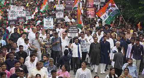 TMC general secretary Abhishek Banerjee with party activists during protest march towards West Bengal Governor house | PTI