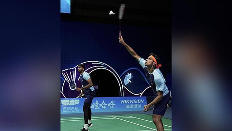 India's Satwiksairaj Rankireddy and Chirag Shetty in action during Men's Doubles Gold Medal badminton match against Korea's Choi Solgyu and Kim Wonho. (Photo | PTI)