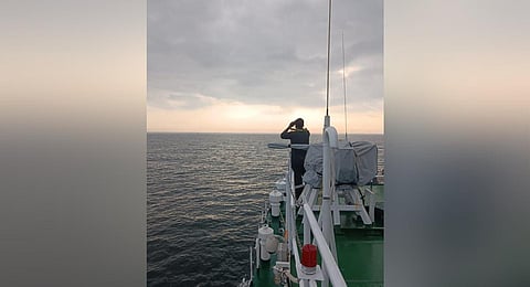 Coast Guard vessel searches for the missing fishermen on Friday