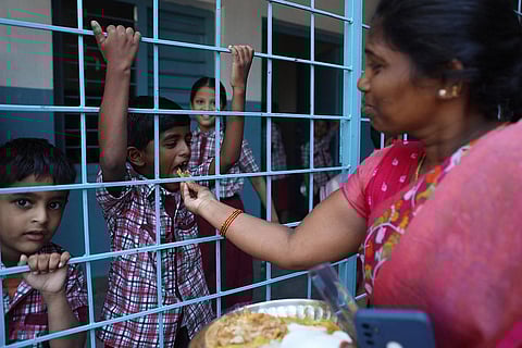 On the first day, a variety of food items, including puri and aloo kurma, idli, upma, and a sweet, were provided to students, parents, teachers. (Photo | Sri Loganathan Velmurugan)