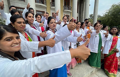 Doctors from various BBMP hospitals celebrate after their centres received National Quality Assurance Standard certificates, at Town Hall on Friday. (Photo | Shashidhar Byrappa)