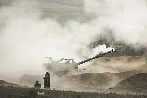 FILE - An Israeli mobile artillery unit fires a shell from southern Israel towards the Gaza Strip, in a position near the Israel-Gaza border, Wednesday, Oct. 25, 2023. (Photo | AP)