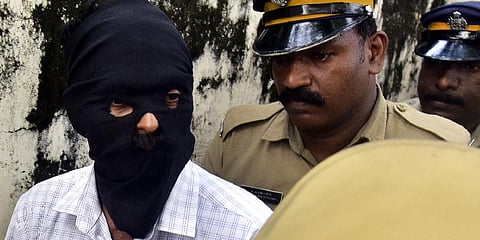 Police officials after completing the evidence collection in Kalamassery bomb blast case, shifting the accused Dominic Martin to police station on Tuesday | A Sanesh, EPS