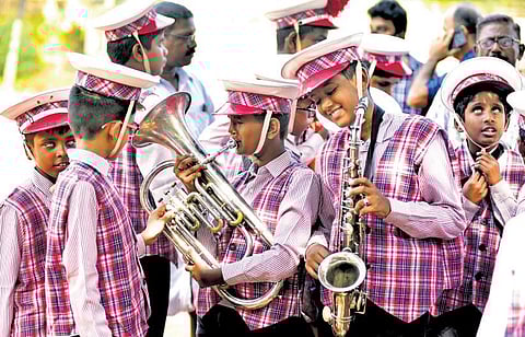 Students of School for the Blind, Aluva, celebrate their win in the band music category