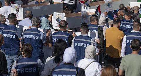 Palestinian journalists carry mock coffins of Palestinian journalists who were killed during the current war in Gaza.(File Photo | AP)