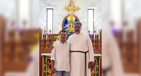 Prakash with church vicar Abraham Cheriyan. (Photo | Express)