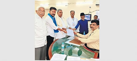 TPCC President A Revanth Reddy, accompanied by Karnataka Chief Minister Siddaramaiah, files his nomination papers in Kamareddy