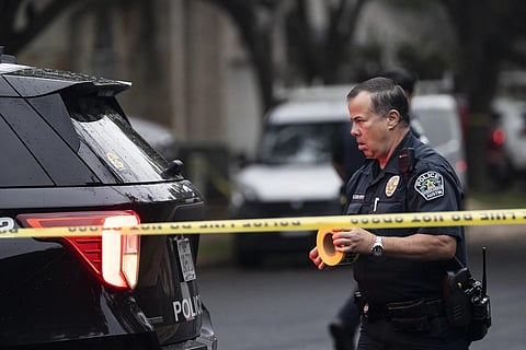 The Austin Police Department investigates the crime scene after a police officer died following a shooting in South Austin, Texas, Saturday, Nov 11, 2023. (Photo | AP)