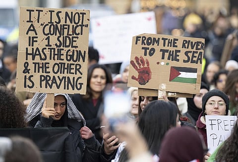 FILE - Young women hold placards during a pro-Palestinian demonstration, in Frankfurt, Germany, Friday, Nov. 3, 2023. (Photo | AP)