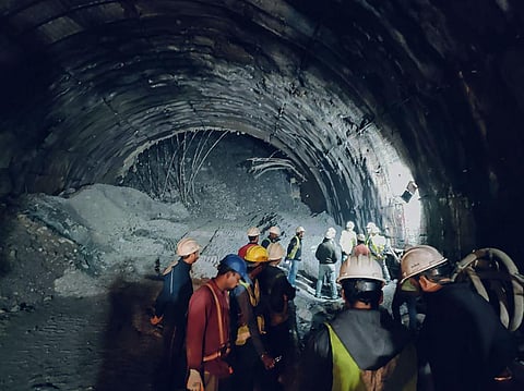 Rescue operation underway after a portion of a tunnel under construction on the Brahmakhal-Yamunotri national highway collapsed, in Uttarkashi district, on Sunday, Nov. 12, 2023. (Photo | PTI)
