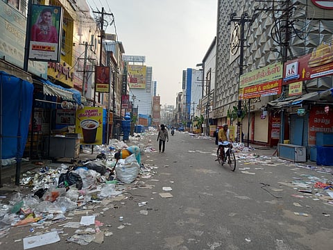 Waste left carelessly by merchants and vendors after Deepavali sales at NSB road in Tiruchy on Monday. (Photo | Jose K Joseph, EPS)
