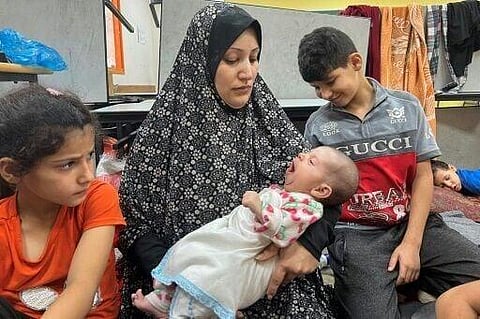Countless new mothers in Gaza now fear the very worst, among them Kullab who said she feels helpless and unable to protect her children. (Photo | AFP)