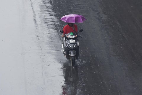 Motorists wade though heavy rain at GST road near Chrompet on Tuesday. (Photo | Ashwin Prasath)