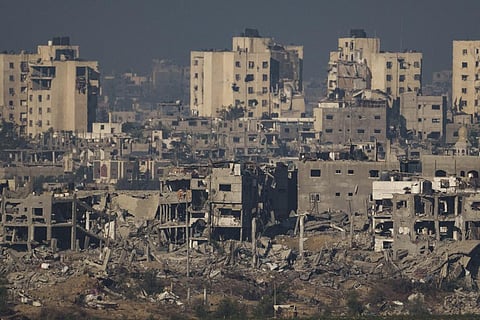 Destroyed buildings stand in the Gaza Strip, as seen from southern Israel, Thursday, Nov. 16, 2023. (Photo | AP)