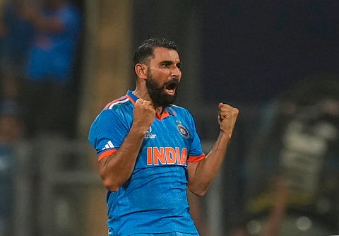 Shami celebrates after dismissing New Zealand's Daryl Mitchell during the ICC World semi-final match between India and New Zealand (Photo | PTI)