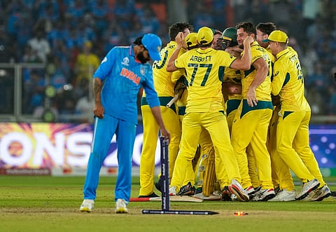 Australian players celebrate after winning the ICC Men's Cricket World Cup 2023 final over India, at the Narendra Modi Stadium, in Ahmedabad. (Photo | PTI)