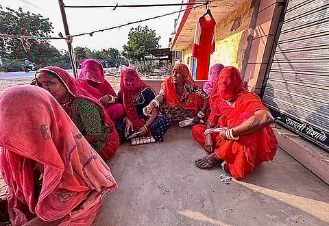 Representational Image: Women at fair price shop ahead of upcoming Rajasthan Assembly elections, in Jodhpur, Monday, Nov. 6, 2023. (Photo | PTI)