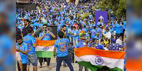 Indian fans arrive at the Narendra Modi Stadium to watch the ICC Men�s Cricket World Cup 2023 final between India and Australia. (Photo | PTI)