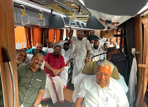 Chief Minister Pinarayi Vijayan and other ministers leave in a bus after the Nava Kerala Sadas programme at Paivalike Higher Secondary School. (Photo | Express)