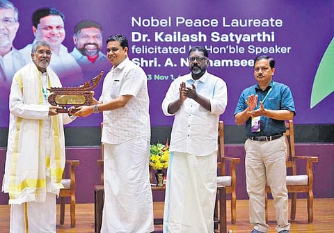 Speaker A N Shamseer honouring Nobel laureate Kailash Satyarthi on the first day of Kerala Legislature International Book Festival, on Wednesday. Deputy Speaker Chittayam Gopakumar is also seen