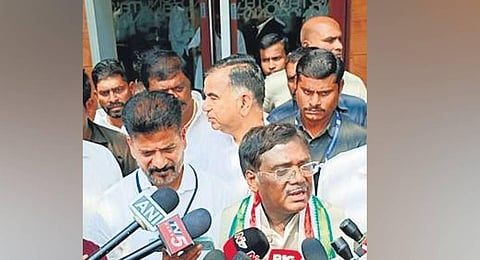 G Vivek Venkataswamy addresses the  media after joining the Congress.